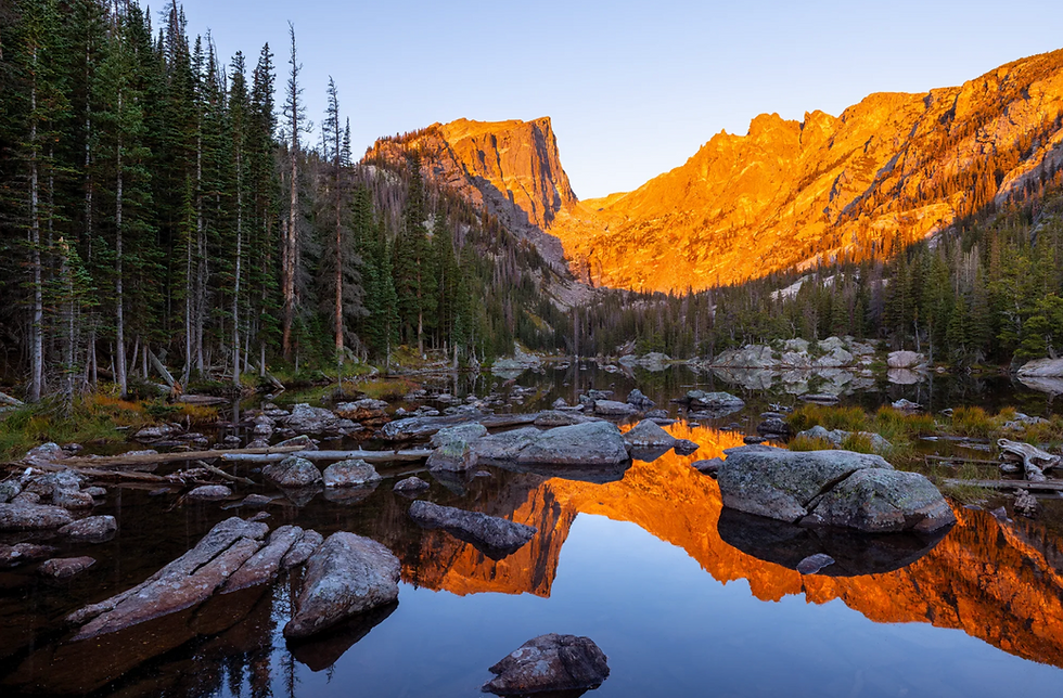 Wide angle view of Bear Lake with mountains and pine trees