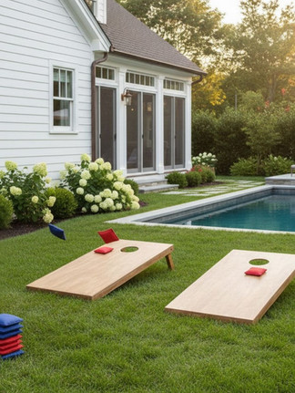 cornhole at a backyard pool party