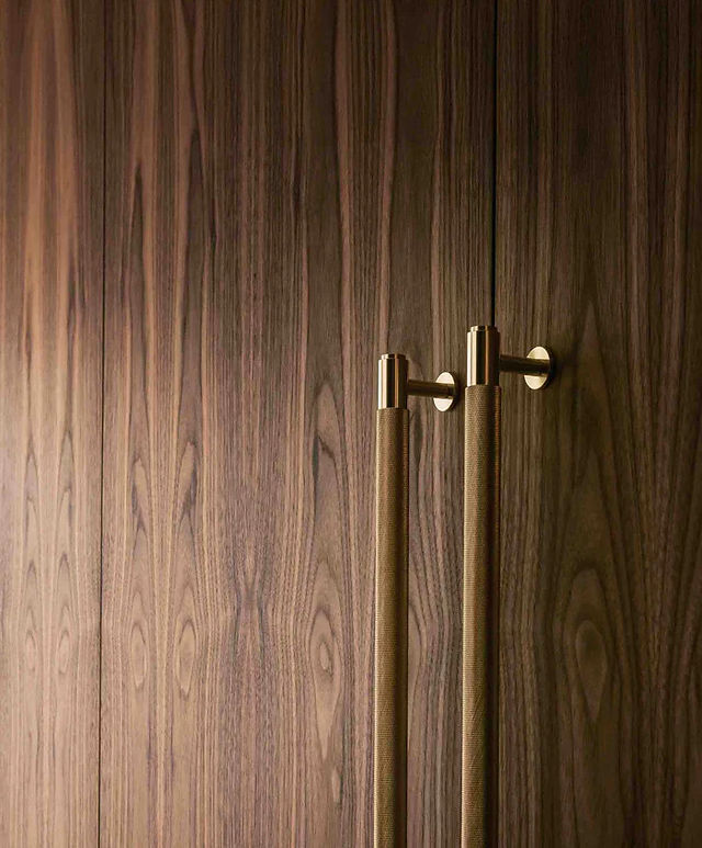 hand-forged door hardware in a refined interior