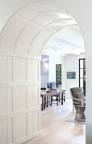 Arched doorway with painted molding detail 