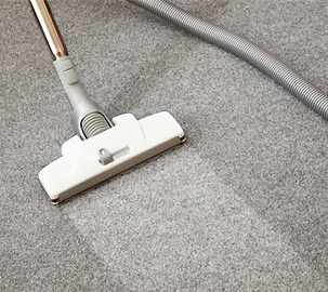 Man Vacuuming