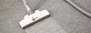 Vacuuming A Carpet