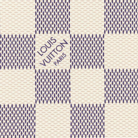 Close-up of a Louis Vuitton bag showing the Damier Azur canvas material