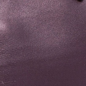 Close-up of a Hermes Birkin bag showing the box calf material