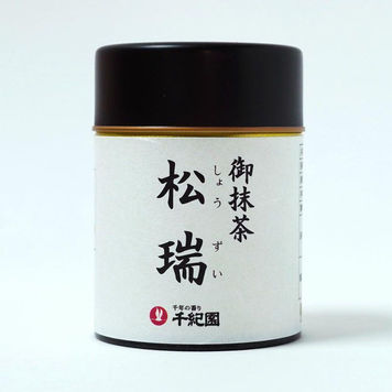 White and black can of matcha