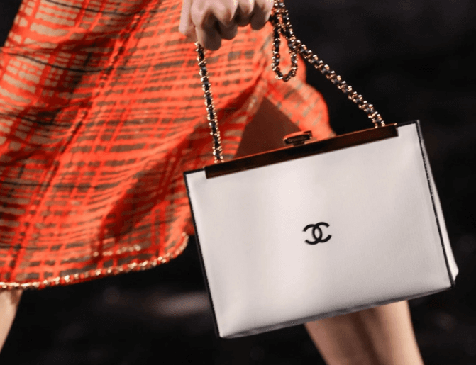White Chanel bag on a fashion show