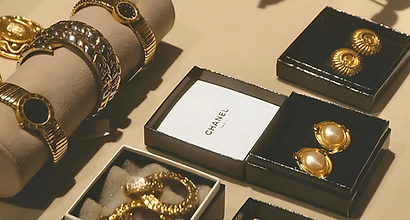 Display of gold watches and jewelry