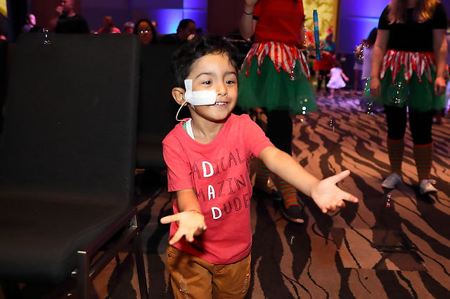 sick child dancing and happy