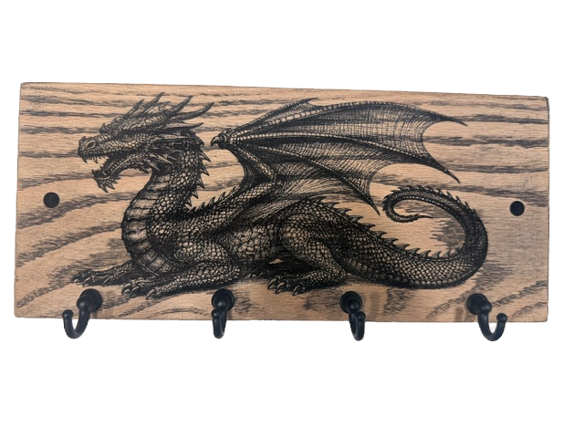 Dragon key hanger organizer with etched dragon on wood.