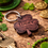 Thumbnail: Wooden shamrock keychain with "LUCKY" on a table, St. Patrick's Day accessories.