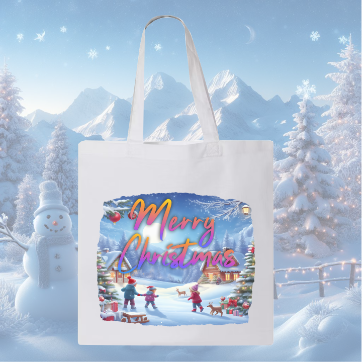 White tote bag featuring 'Merry Christmas' in a snowy village scene.