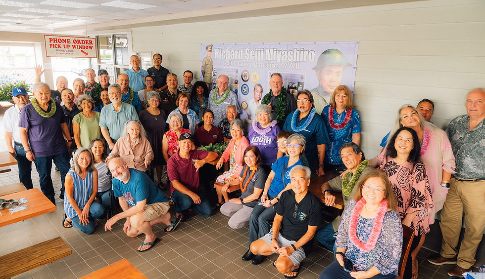 Some of the family and friends of Cafe 100 at the April 13 dedication. 
