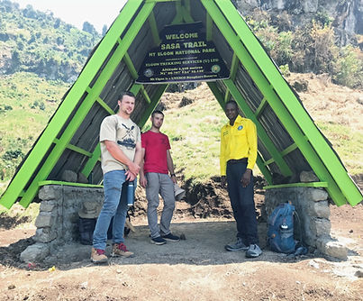 Visitors standing at Sasa Trail Gate