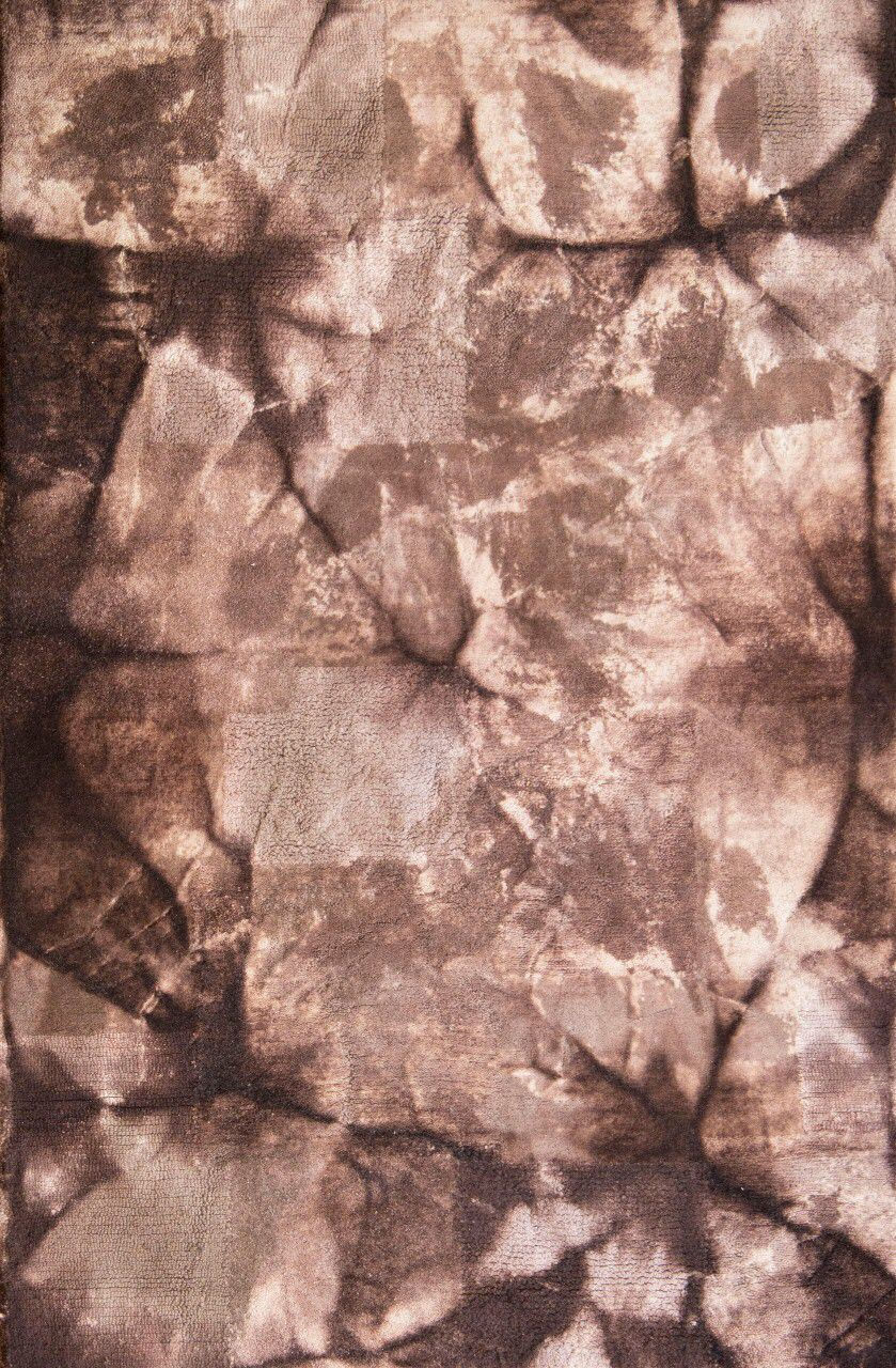 Handtufted in New Zealand Wool