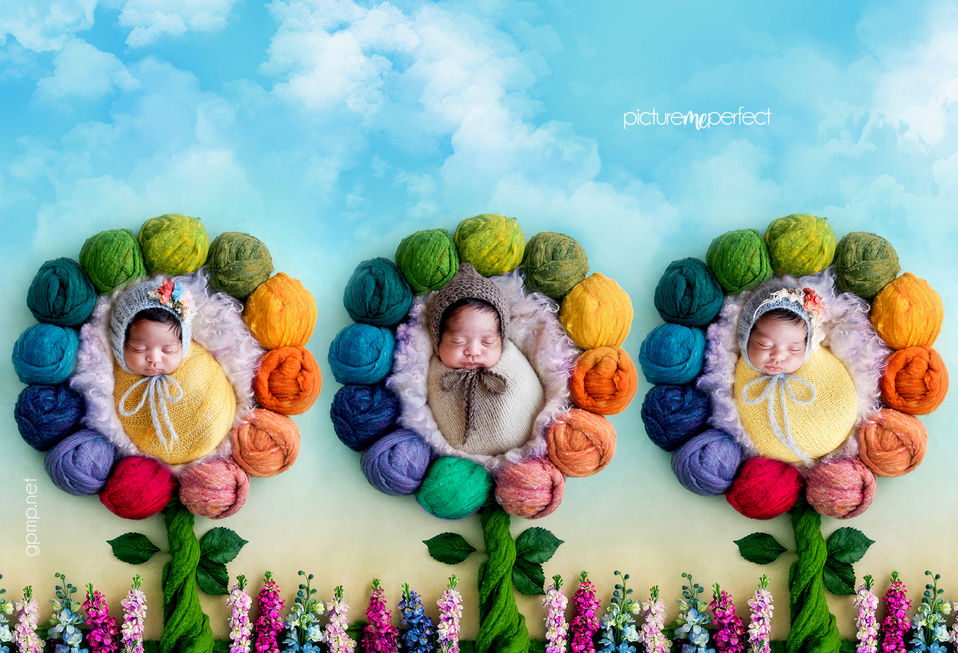 Triplets. IV babies, newborns in colorful yarn flowers under a blue sky. Miami photo shoot  at Savanna