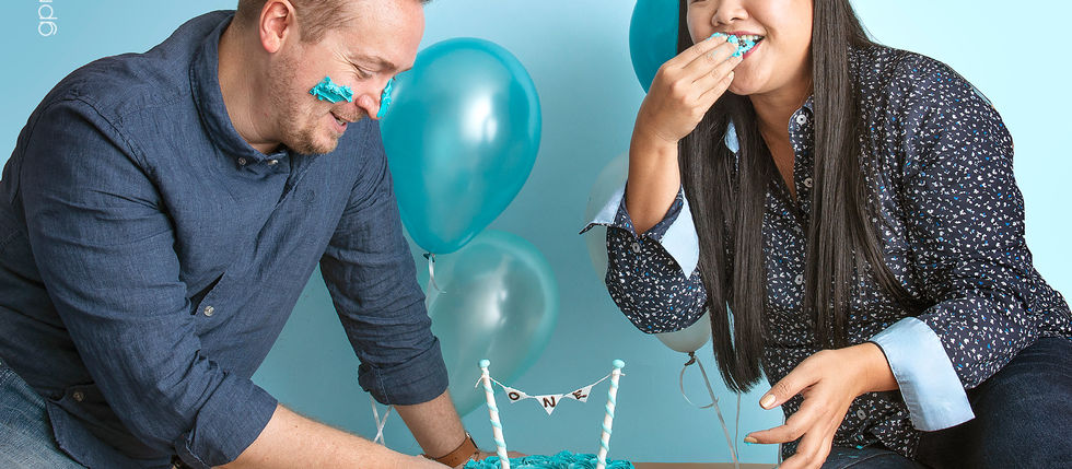 First birthday cake smash session capturing a baby's genuine emotions and personality