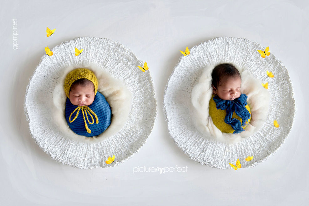 twin sleeping babies wrapped in blue and yellow with butterflies, Miami Silver Shores photo session