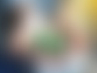 Hands holding coin and a plant.