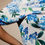 Thumbnail: Midi dress blue and white floral assymetrical neckline