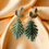 Thumbnail: Botanical Leaf Dangle Earrings – Gold & Green Resin Fern Design
