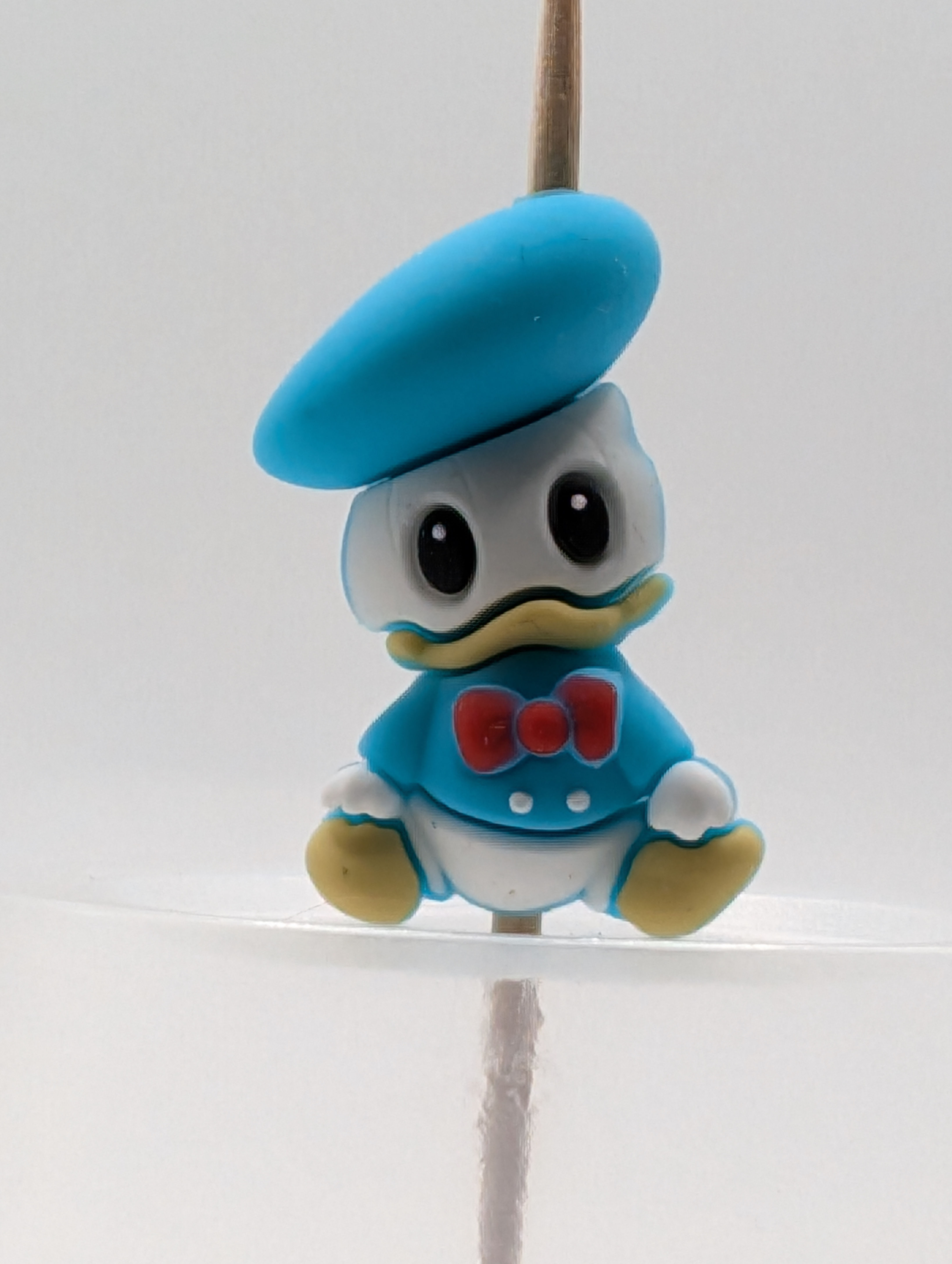 Looks similar to Donald duck 3D silicone focal bead 
