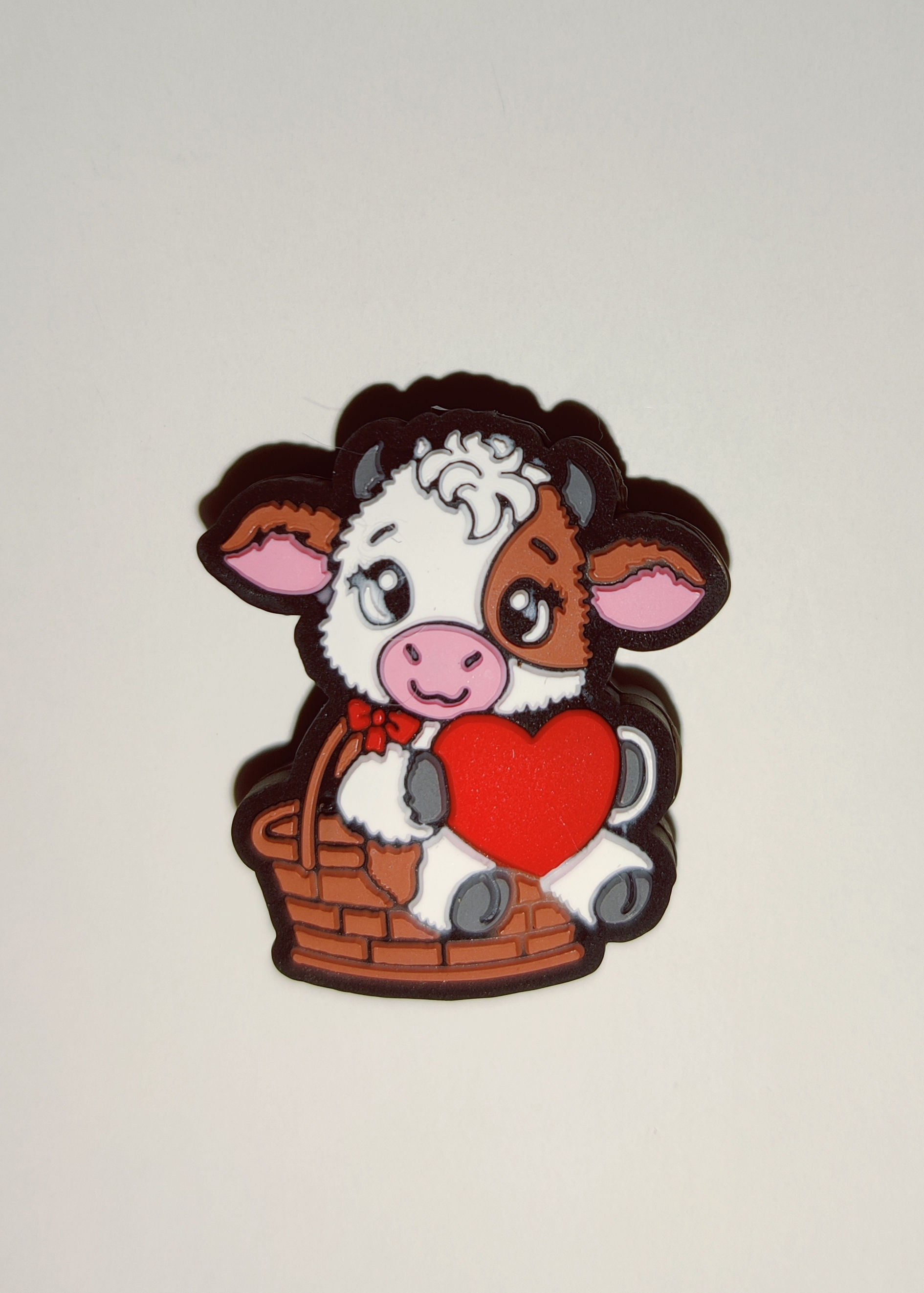 Cow holding heart sitting in basket silicone focal bead