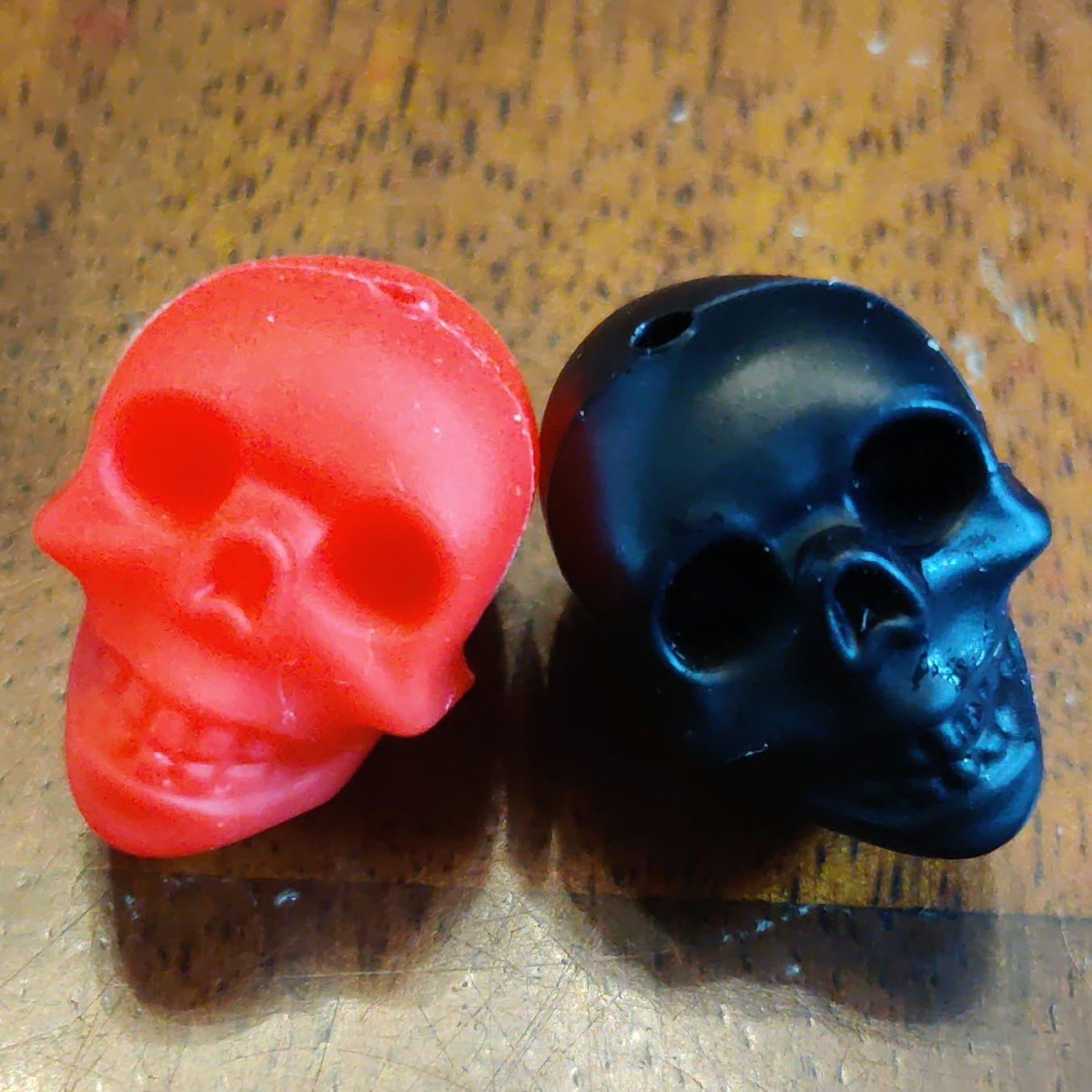 2 pack- Black and red 3D skull face silicone focal beads