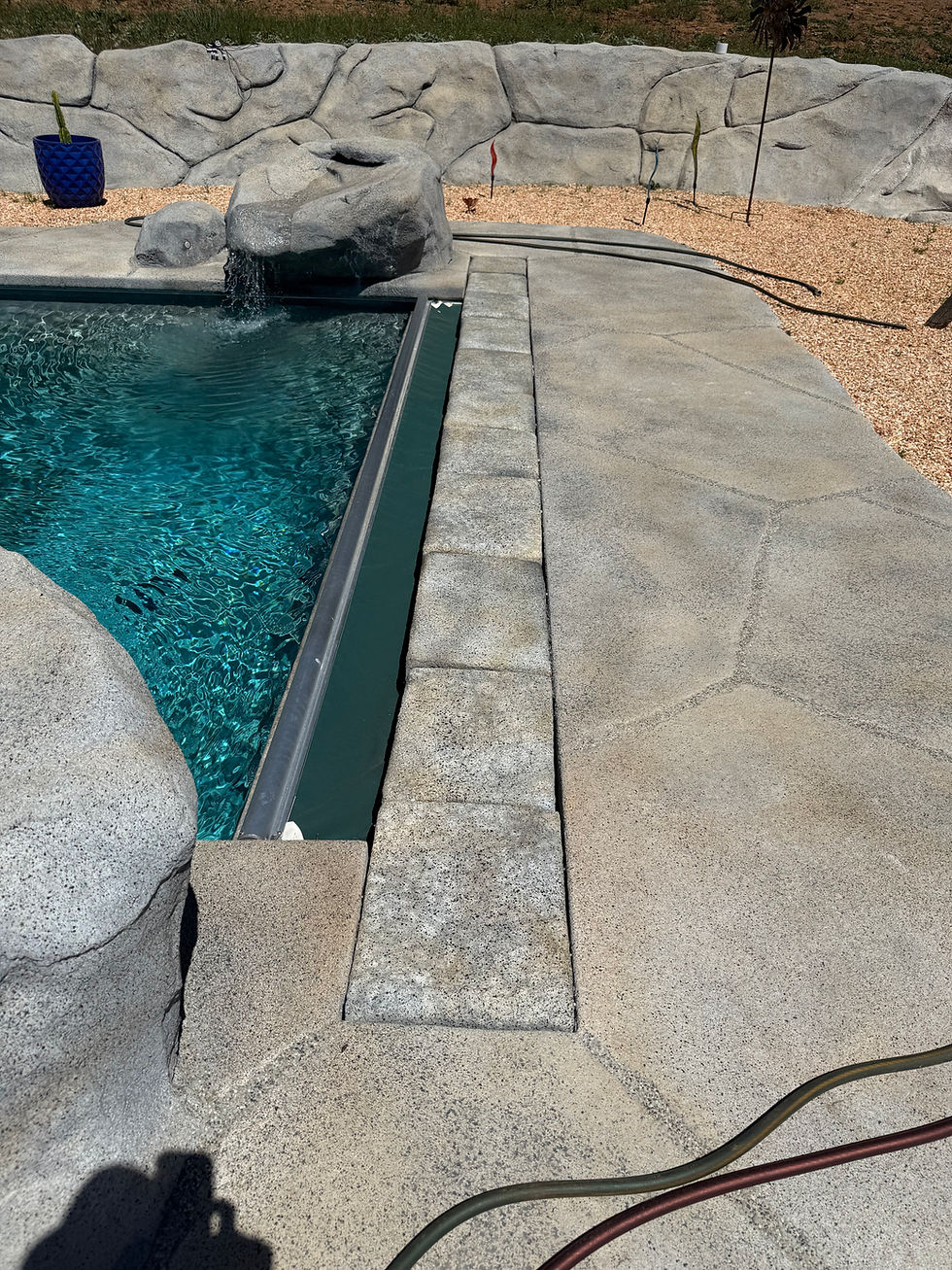 Custom lap pool with automatic retractable pool cover built by Yuba River Swimming Holes & Pools serving Auburn, Grass Valley, Nevada City, Loomis, Granite Bay, Rocklin, and Roseville CA.