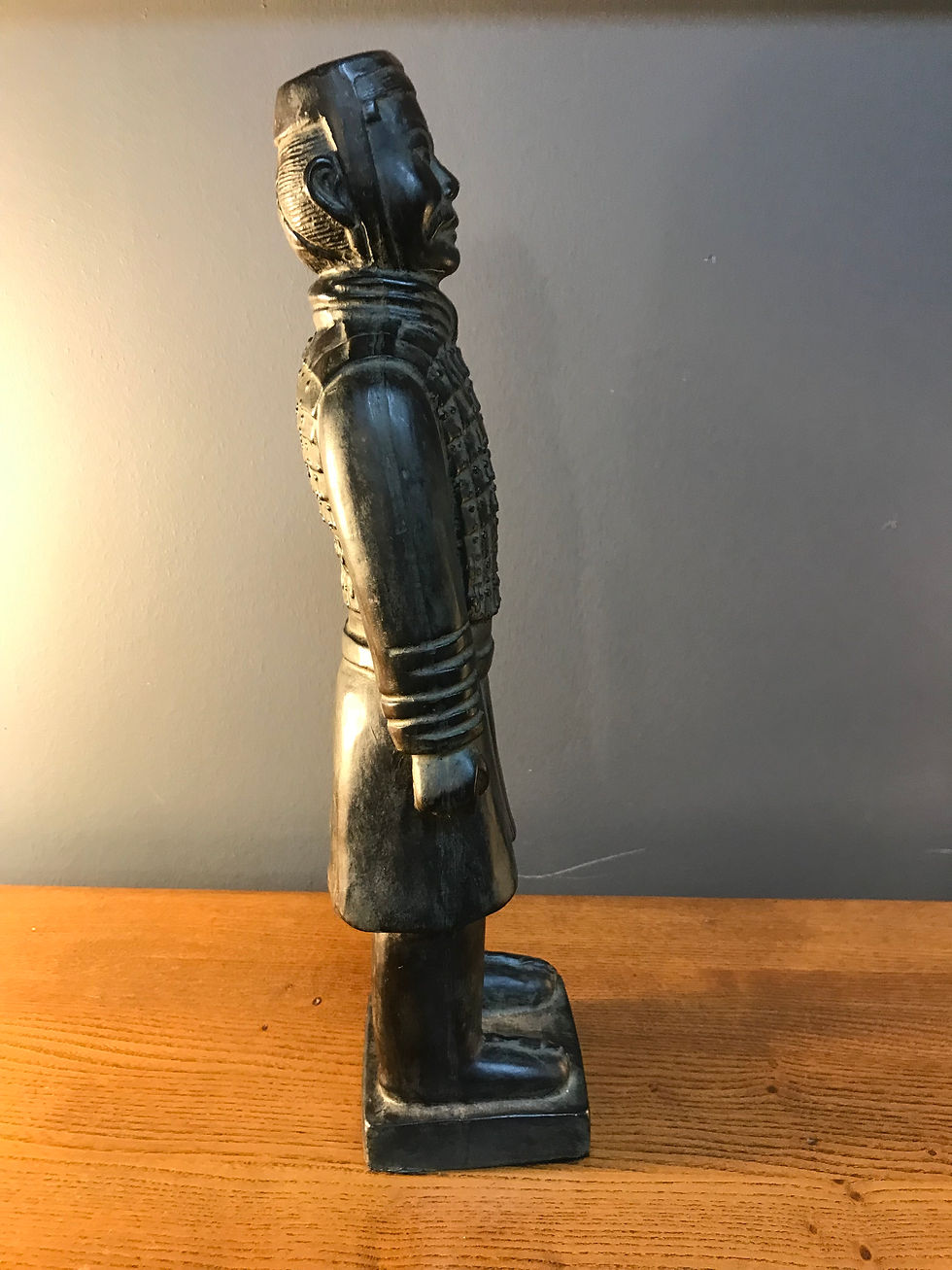 20TH CENTURY BLACK CERAMIC FIGURINE