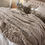 Thumbnail: Camberwell Taupe Throw styled on a bed.