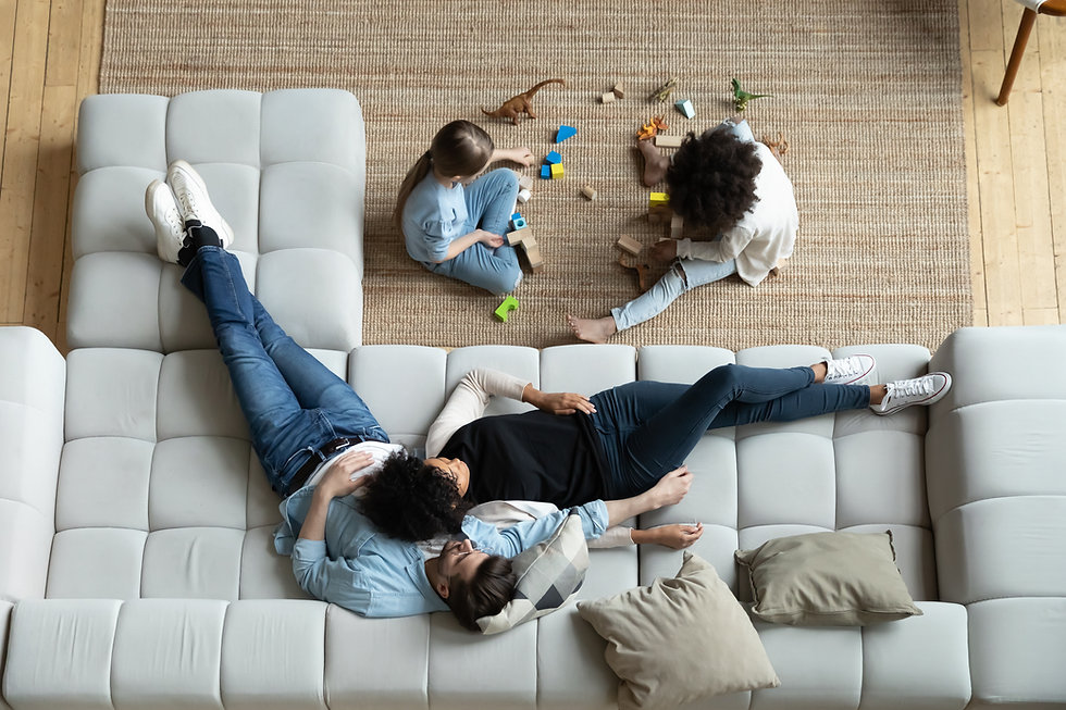 Diverse family enjoying their recently purchased and financed new home with a great mortgage from LHM Financial, formerly CNN
