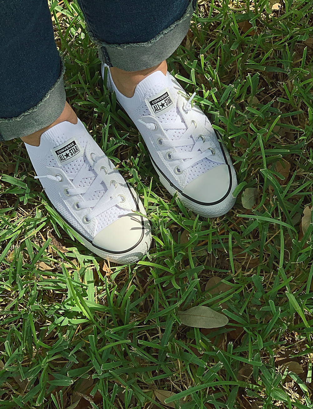 Standing on grass with Converse on