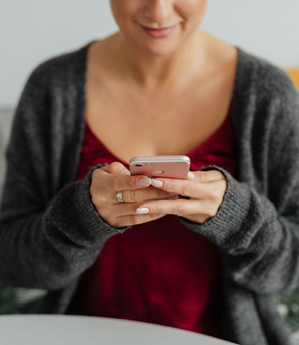 kaboompics_a-brunette-woman-works-with-a-laptop-and-a-phone-13809.jpg