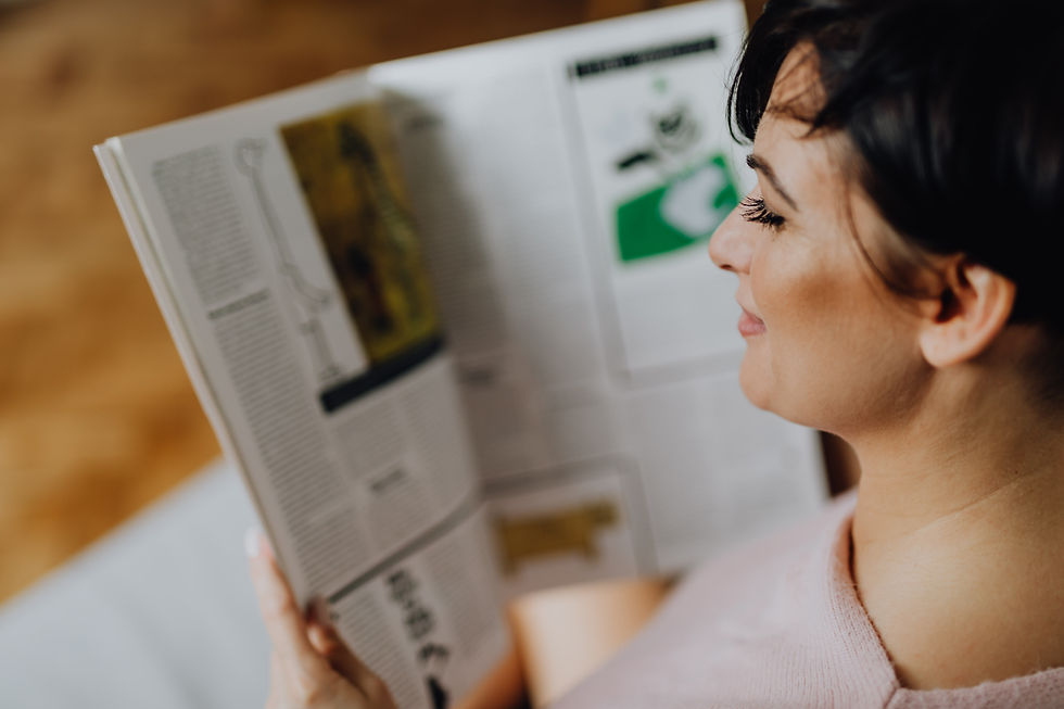 kaboompics_a-woman-with-short-dark-hair-reads-a-newspaper-10337 (1).jpg