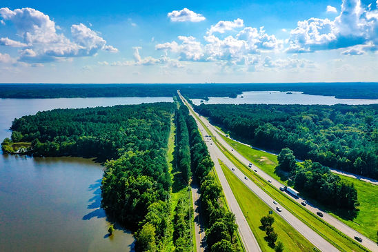 aerial-view-falls-lake-north-carolina-interstate-highway-with-cloudy-blue-sky.jpg