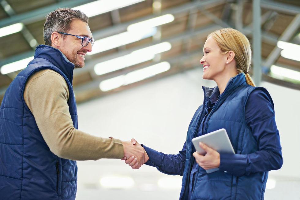sign business owner and client shaking hands