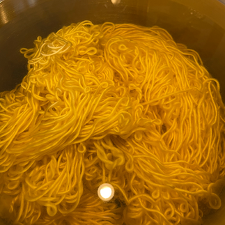 Yarn in dye bath
