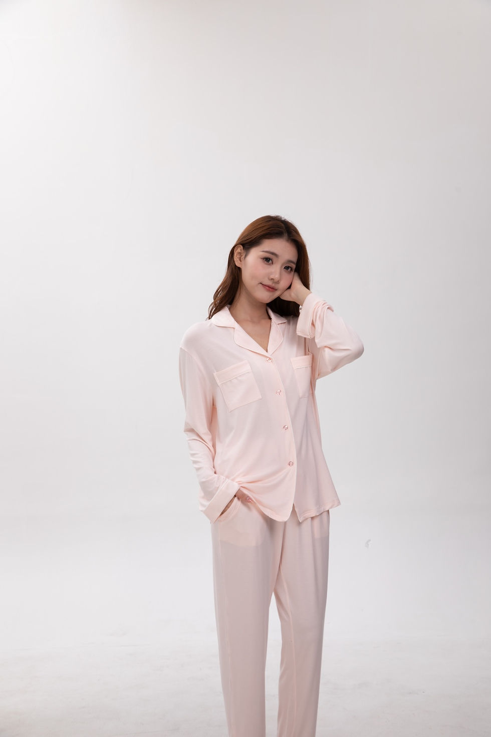 Woman in pink pajamas