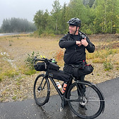 Bikepacker in the rain
