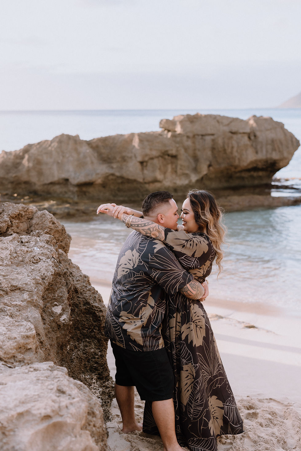 Rickey and Kandayce Kamai on the beach in love