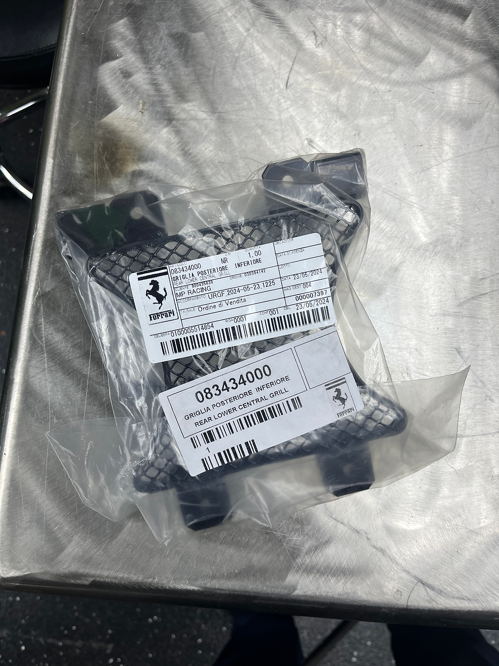 Original Ferrari 458 Challenge Rear Lower Central Grill Part Number 083434000 in factory bag