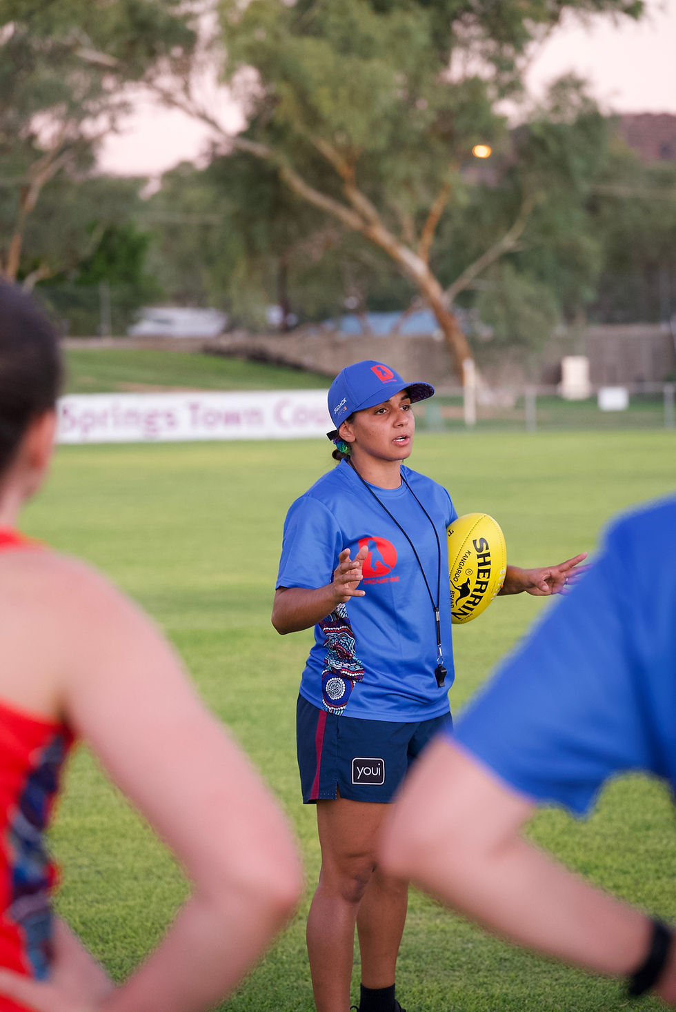 female athlete takes a training session for girls in regional & remote alice springs