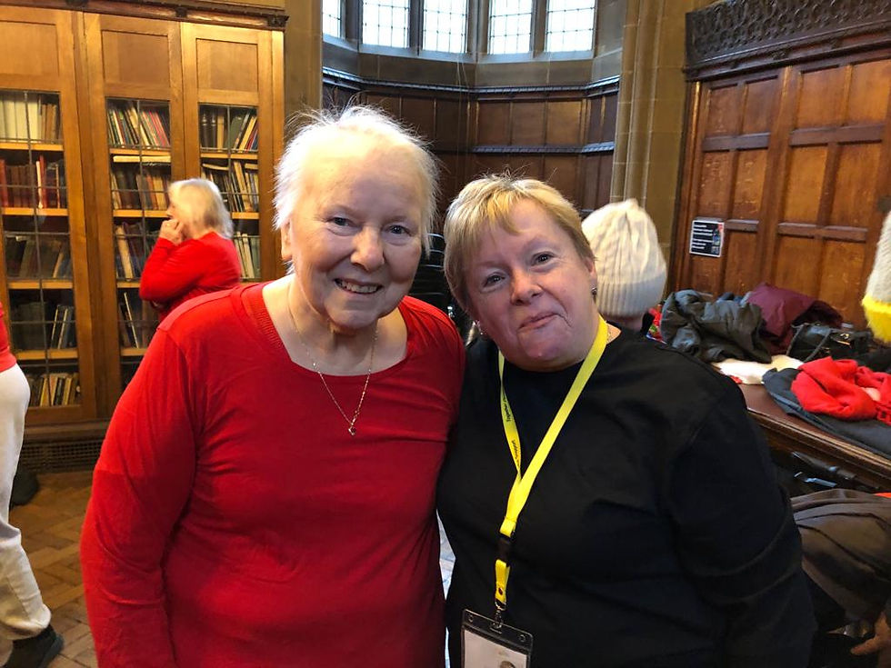 Two older ladies smiliing for the camera