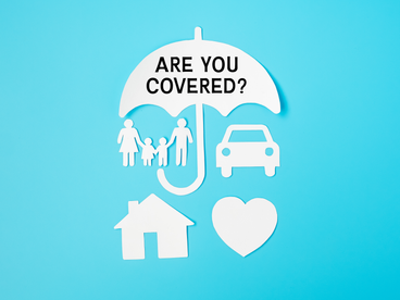 Umbrella cover family, home and Car shape paper on blue background
