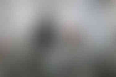 Baker Labels staff operating advanced digital printing machines showcasing sustainable and innovative manufacturing