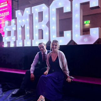 Two 21UP Movement youth participants building friendship during the MBCC Awards