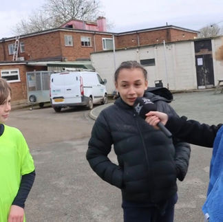 A youth participant conducting an interview with fellow 21UP Movement participants during the programme