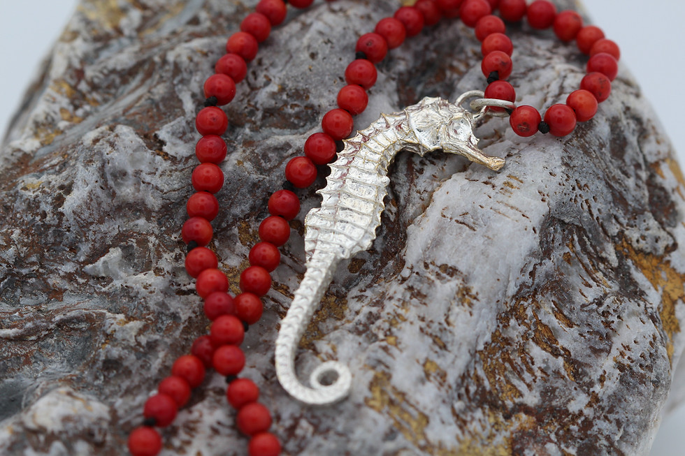Thumbnail: Silver Seahorse with recycled coral beads