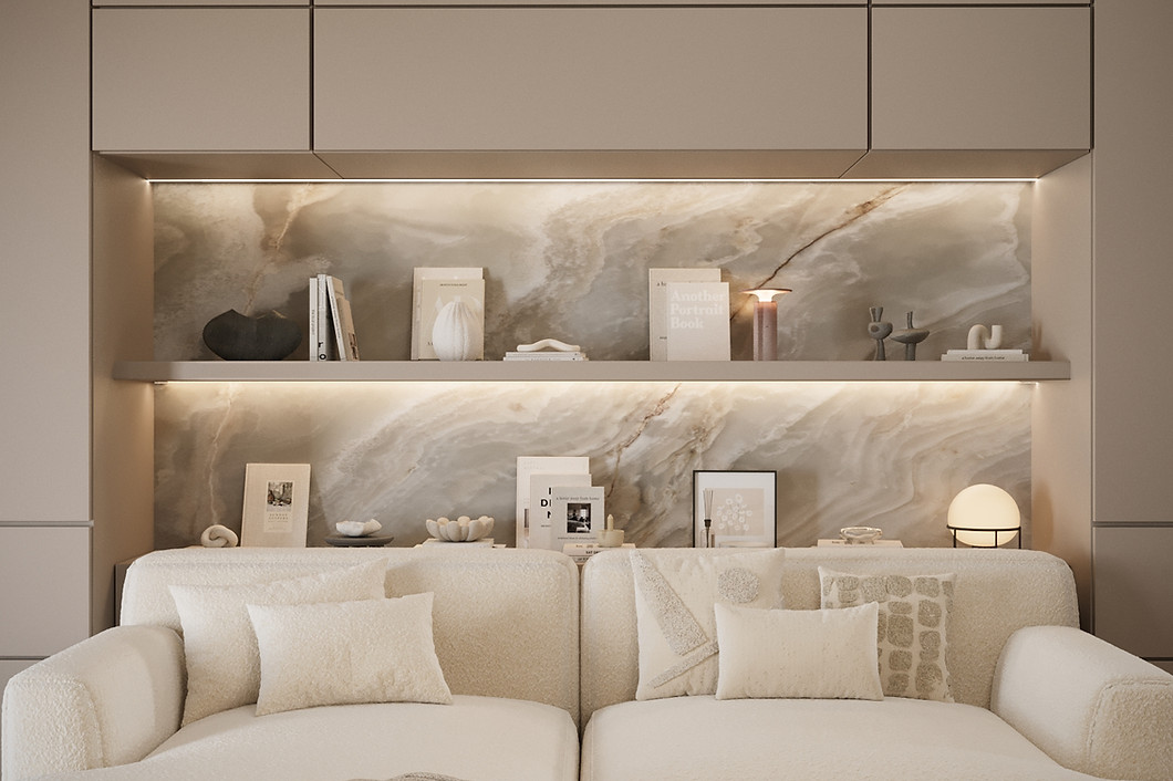 Custom living room wall with illuminated stone shelves, neutral cabinetry and a soft cream sofa.