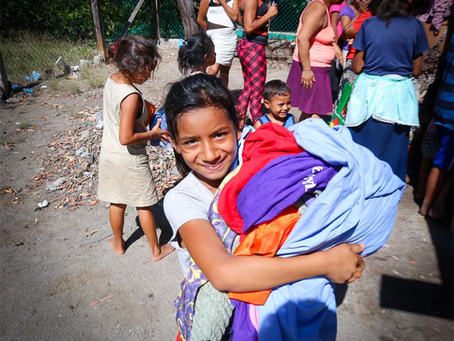 Donation of clothes, shoes, basic grains and personal hygiene kits